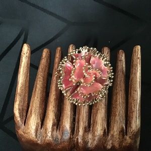 Statement floral ring with gold tone accents ; stretchable band
